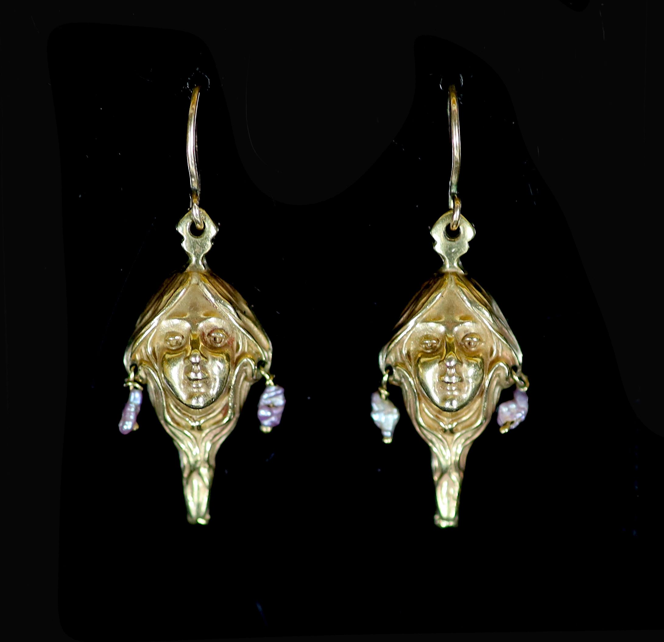 A pair of Art Nouveau gold and baroque pearl set drop earrings